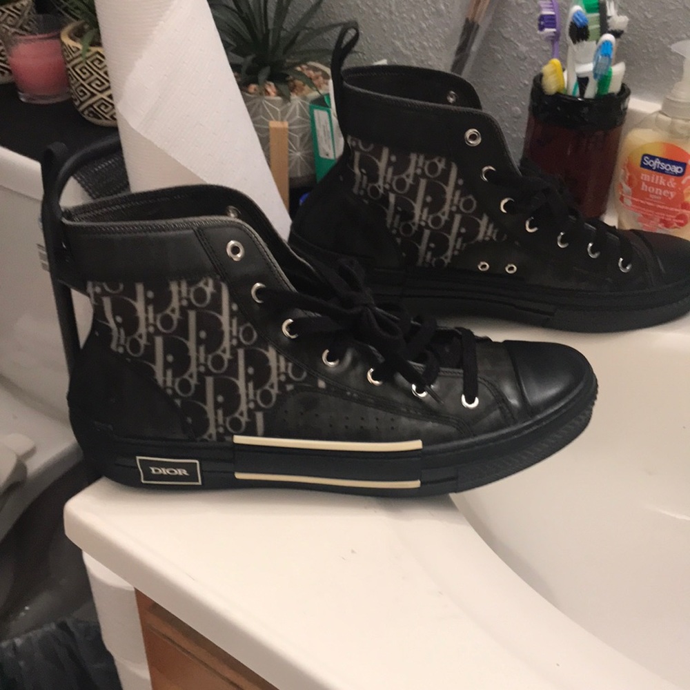 I am selling a pair of black Dior designer shoes for 400